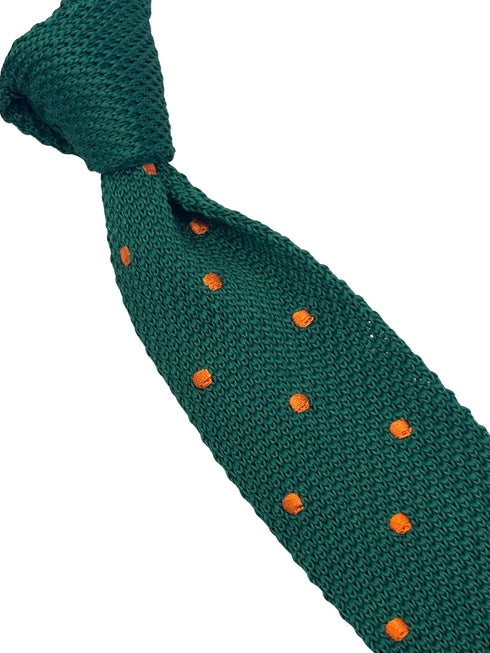 knitted tie in emerald green with an orange polka spots design