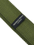 knitted tie in khaki green with white polka dots