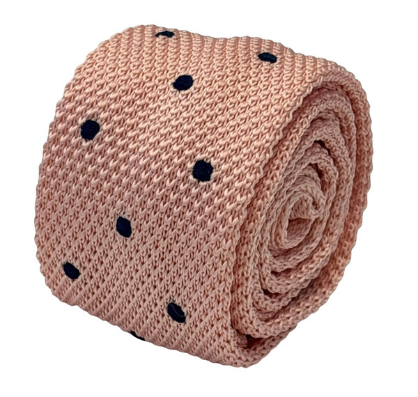 knitted tie in baby light pale pink with dark navy blue spots