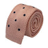 knitted tie in baby light pale pink with dark navy blue spots