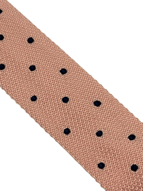 knitted tie in baby light pale pink with dark navy blue spots