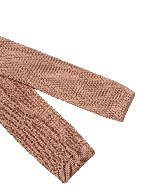 knitted tie in baby light pale pink with dark navy blue spots