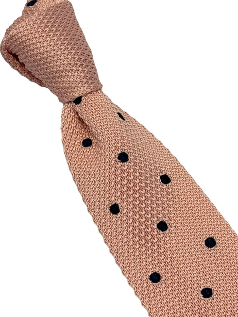 knitted tie in baby light pale pink with dark navy blue spots