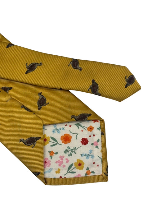 mustard yellow tie with embroidered grouse design