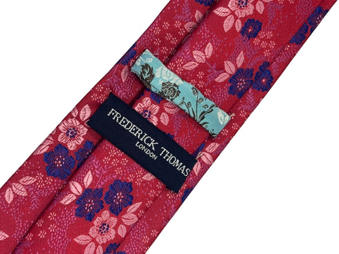 dark pink cerise tie with a floral design