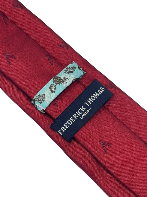 dark red tie with embroidered burgundy deer head design