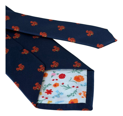 navy blue tie with red squirrel design