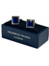 square cufflinks with subtle shades of blue stone