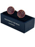 red and blue cufflinks in a circular target design