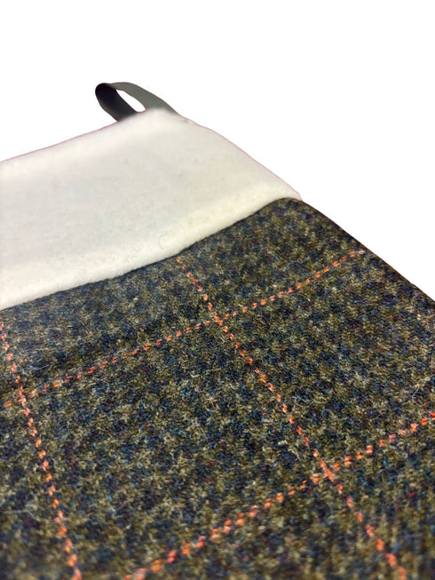 tweed wool Christmas stocking in green with orange gold windowpane