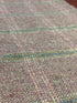 tweed wool Christmas stocking in pink with white and green windowpane and pink top