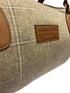 Luxury tweed weekend bag with matching wash bag in beige light fawn brown traditional check 100% wool tweed with leather straps