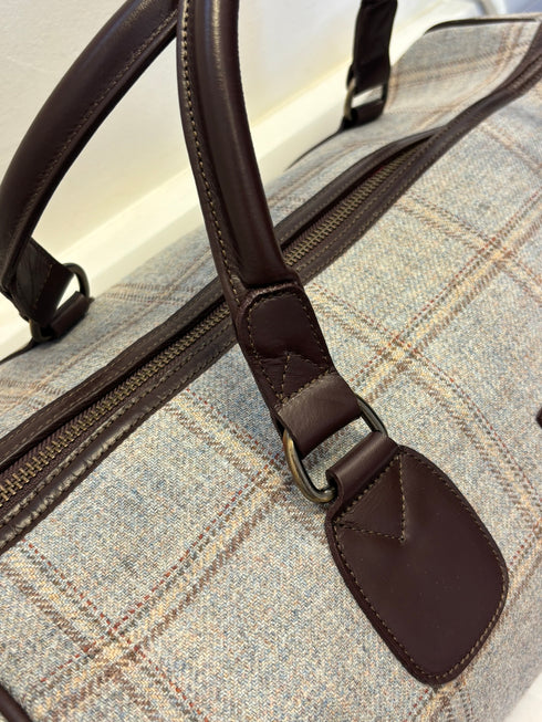 Luxury weekend overnight bag in light blue check with leather handles