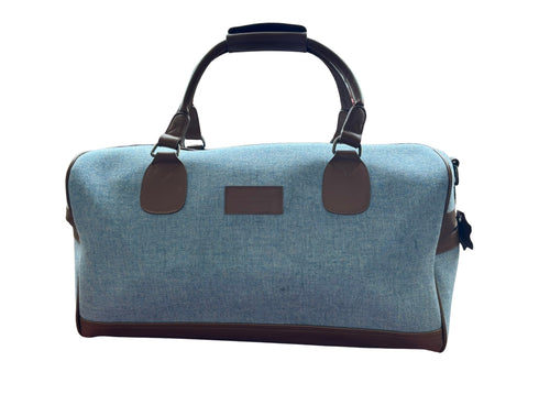 Luxury weekend overnight bag in medium blue with leather handles