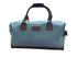 Luxury weekend overnight bag in medium blue with leather handles