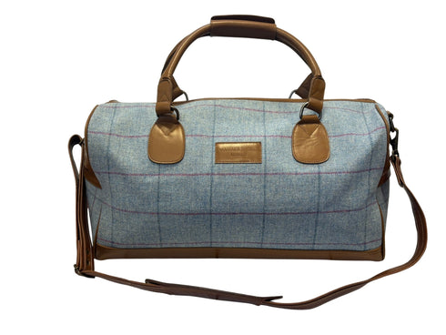 Luxury weekend overnight bag in medium blue check with leather handles