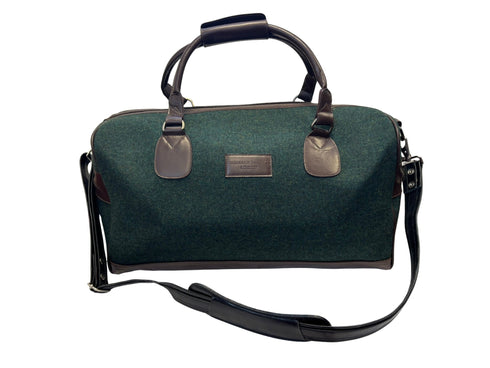 Luxury weekend overnight bag in dark forest green with leather handles
