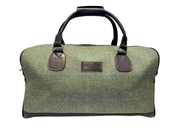 Luxury weekend overnight bag in hunter forest green with plaid check and leather handles
