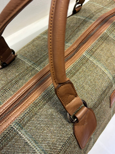 Luxury weekend overnight bag in forest green with plaid check and leather handles