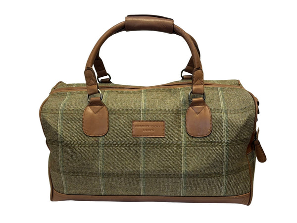 Luxury weekend overnight bag in forest green with plaid check and leather handles