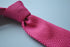 plain bright pink skinny knitted tie with pointed end