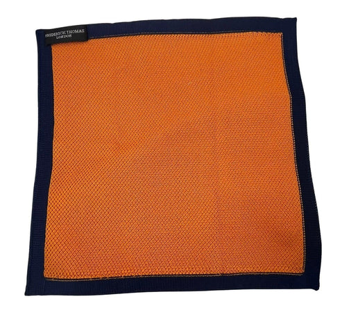 orange knitted pocket square with navy dark blue edging