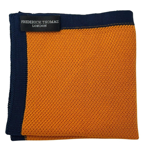 orange knitted pocket square with navy dark blue edging