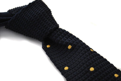 navy blue skinny knitted tie with gold polka dots