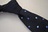 navy blue skinny knitted tie with light blue polka dots