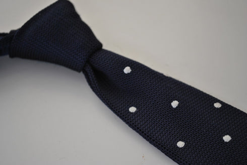 knitted navy skinny tie with white polka dots