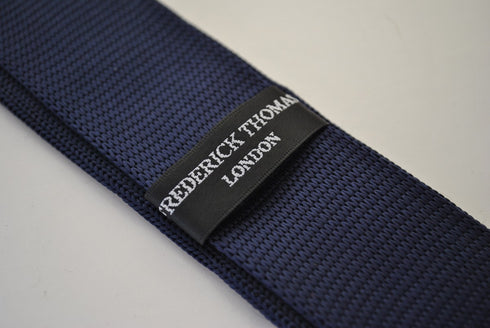 knitted navy skinny tie with white polka dots