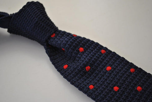 navy blue skinny knitted tie with red polka dots design