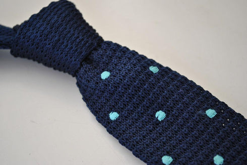 knitted navy blue tie with light blue polka dots