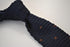 navy blue skinny knitted tie with brown polka dots