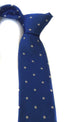 electric blue tie with white polka dots