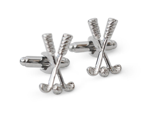 silver coloured golf clubs and ball cufflinks