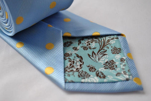 light blue tie with yellow polka dots