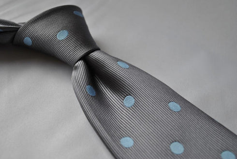 grey tie with light blue polka spot