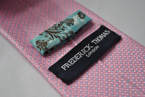 pink and light blue pin spots tie