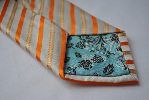 orange and white striped tie