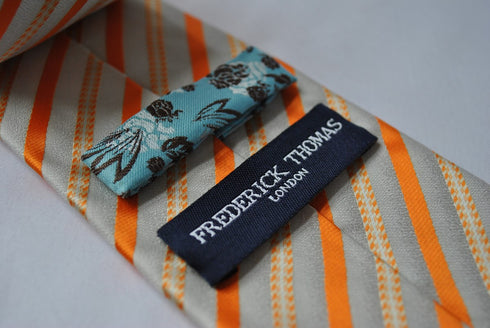 orange and white striped tie