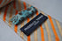 orange and white striped tie