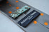 grey tie with orange polka dots