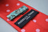 red tie with pink polka dots