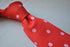 red tie with pink polka dots