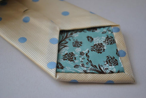 champagne tie with light blue polka dots