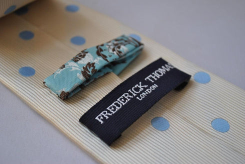 champagne tie with light blue polka dots