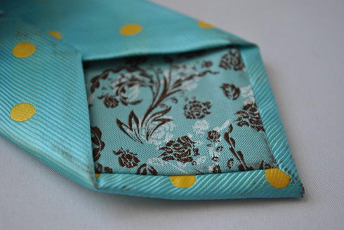 turquoise tie with yellow polka dots