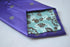 purple tie with grey polka dots