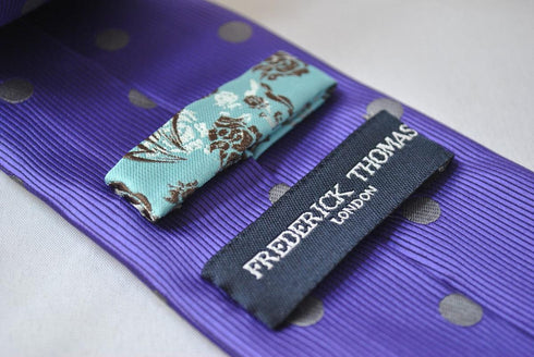 purple tie with grey polka dots